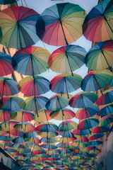 Fototapeta na wymiar colorful umbrellas in the alley