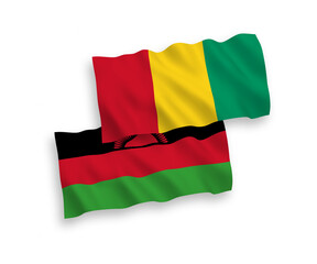 Flags of Malawi and Guinea on a white background