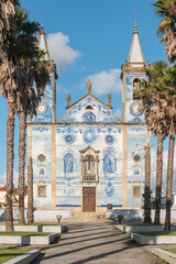 Architectural detail of the church Santa Marinha in Cortegaca - Ovar, Portugal. View at the azulejo decoration facade.