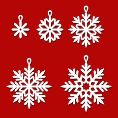Naklejka na ściany i meble Set of pendants of snowflakes. Hanging decorative ornaments for Christmas, New Year, winter holidays. Vector template for plotter laser cutting of paper, wood carving, metal engraving, cnc.