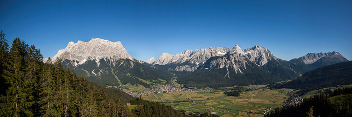 Fototapeta na wymiar Panorama view Zugspitze mountain and Ehrwalder Sonnenspitze mountain in Tyrol, Austria