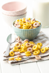 Colorful cereal rings in bowl.
