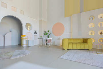 modern open-plan room interior in futuristic style in pastel colors with graphic wall decoration. very high ceilings and a huge window. soft stylish furniture with gold metallic elements