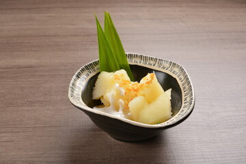 cold Tapioca with fresh coconut milk cream sauce dessert in bowl on wood table asian halal menu