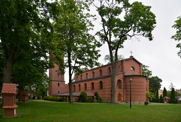 Fototapeta na wymiar Built in 1846, the neo-Roman Catholic church of Blessed Karolina Kózkówna in the village of Biskupiec, warmi in Poland.