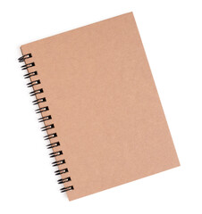 Top view of spiral kraft notebook front on white background.
