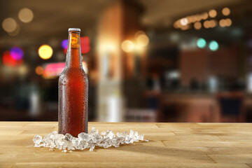 Bottle of beer and free space for your decoration 