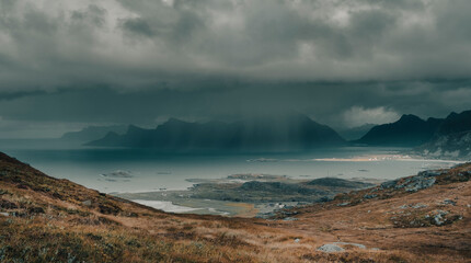 dramatic view, heavy rain over the north sea in polar norway, view from the mountains in the Lofoten islands