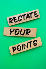 Text sign showing RESTATE YOUR POINTS