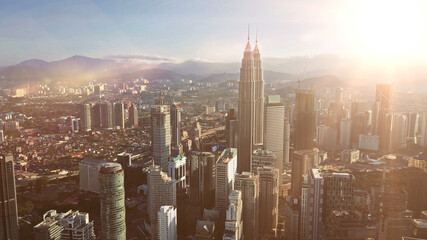 Epic sunset in financial center of Hong Kong. AERIAL view.