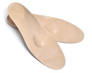 A pair of orthopedic insoles. Isolated on white background