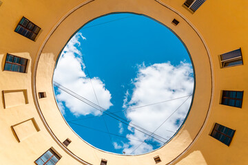 View of the sky in the courtyard of the round house in St. Petersburg © KseniaJoyg