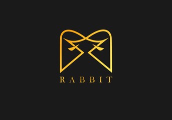 Letter M golden rabbit logo