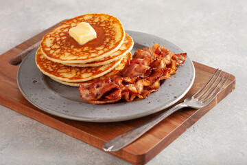 sweet pancakes with butter and bacon. traditional american breakfast