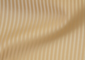 Crumpled warm beige striped fabric. Fabric texture,background for design.