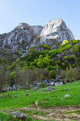 The mountains, Pastures and woods of the val di mello during spring, near the town of San martino, Lombardy, Italy - May 2021.