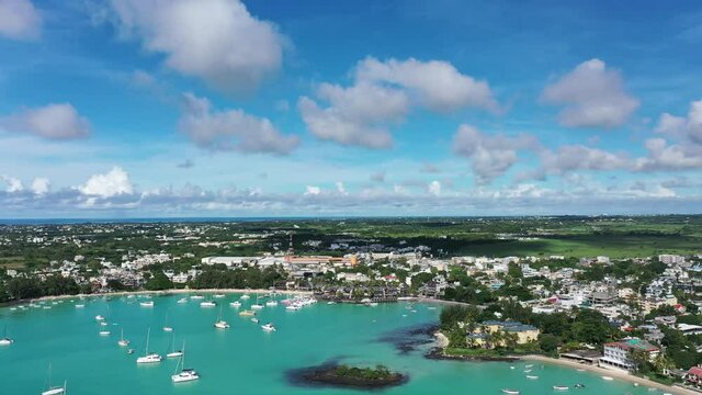 Aerial view, flight at beaches with luxury hotels with water sports and boats at Trou-aux-Biches Pamplemousses Region, Mauritius, Africa