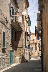 one of the narrow, picturesque street in Tropea, very popular touristic town in Calabria, Italy - obrazy, fototapety, plakaty