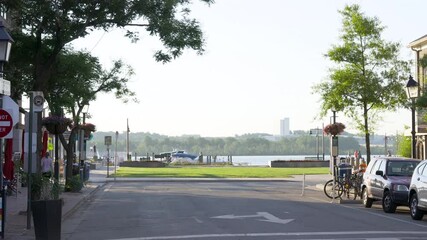 ALEXANDRIA, UNITED STATES - Jun 19, 2021: Alexandria, Virginia, USA- June 18th, 2021: A 4k video of the bottom of King Street in Old Town Alexandria during the early morning.