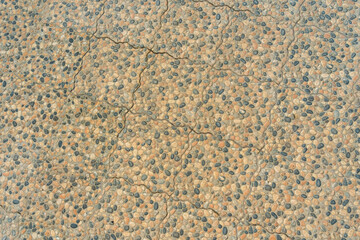 Abstract tile pattern, texture with small stones in light brown color