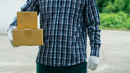 The delivery man carried a cardboard box in a white glove and the delivery was fast and free....