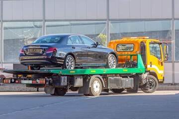 Recovery truck to transport on the highway in the city.