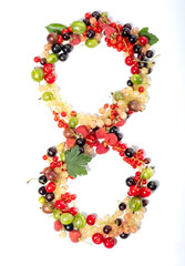 Number eight from real natural berries and leaves. Numbers concept made from berries. Summer creative concept.