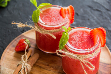 Healthy smoothie of fresh summer berries. Creative atmospheric decoration