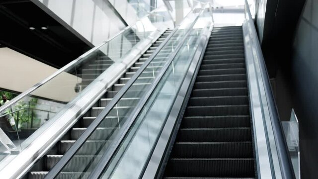 Transport escalator in city without people from lockdown. COVID-19 outbreak. bankruptcy transportation business