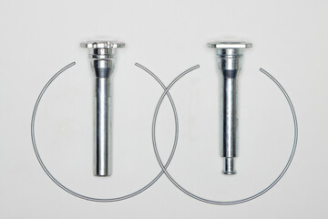 Caliper repair kit, metal pins and retaining rings. Set of spare parts for car brake repair....