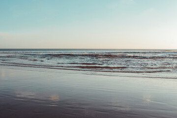 calm wave, blue ocean and blue sky daylight, tropical beach