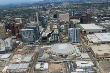 Aerial view of the growth of downtown Phoenix Arizona US looking west in the distance