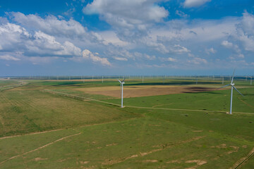 Panoramic view wind farm with blades turbine in a field in West Texas