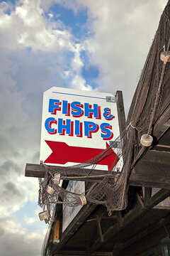 Restaurant signboard with arrow symbol