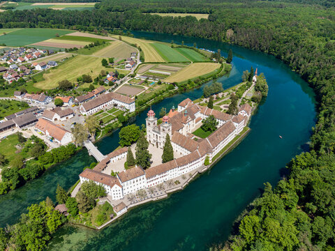 Switzerland, Canton of Zurich, Rheinau, Aerial view of�Rheinau Abbey and surrounding forest in summer