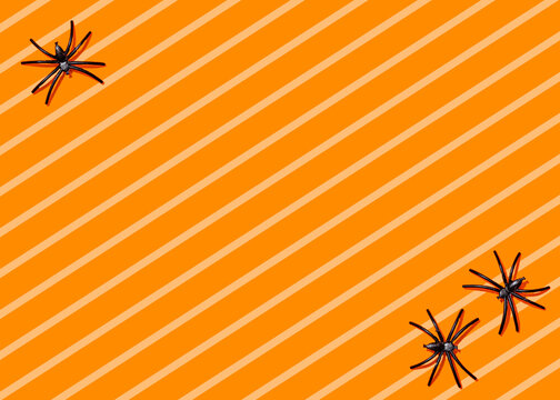 Striped Halloween background with spiders in corners
