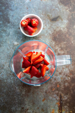 Chopped strawberries in blender