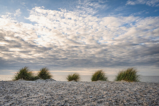 Cloudy sunset over beach at Fehmarn island