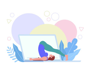 Woman doing yoga pose from home computer