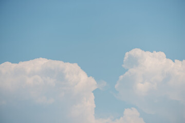 dreamy clouds on a blue sky over a lake