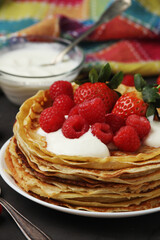 Russian cuisine national dish bliny with fresh berries