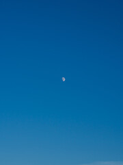 moon on blue sky with place for text