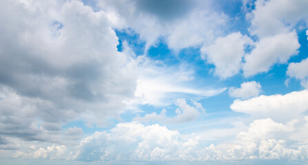 Beautiful white fluffy cloud on blue sky background.