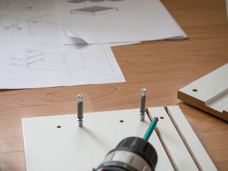 furniture assembly concept, furniture assembly with a screwdriver