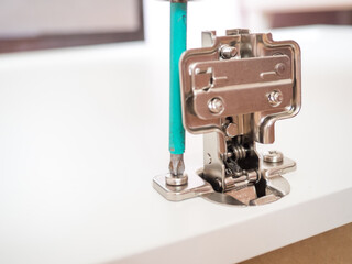 furniture assembly concept, furniture assembly with a screwdriver
