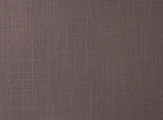 Brown fabric background with a small round rib. Cotton fabric with a simple pattern
