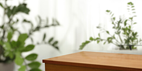 Desk of free space and blurred window background 