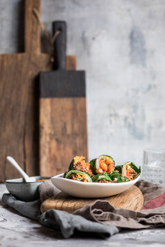 Steamed chard leaves spring roll with chopped vegetable and meat filling in tray