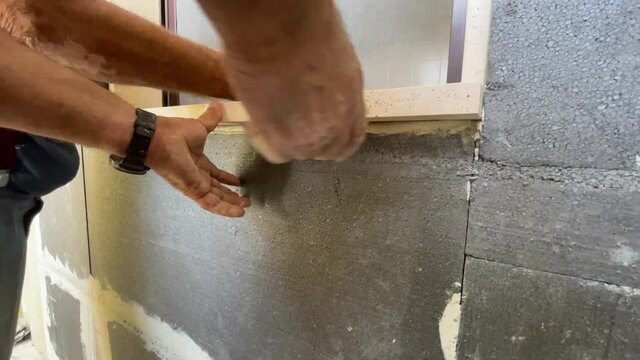 Meen measuring Marble level on Blurred background