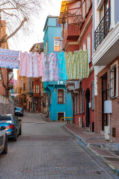Turkey, Istanbul, Laundry drying over alley in Balat neighborhood